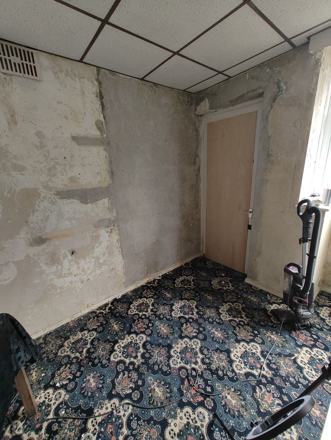 A bare, stripped-back room before the podcast studio was built