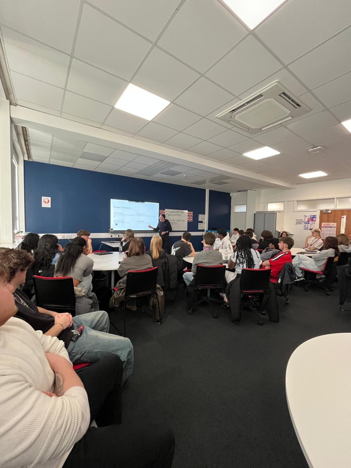 A full classroom of students attending a talk by Steve Potter